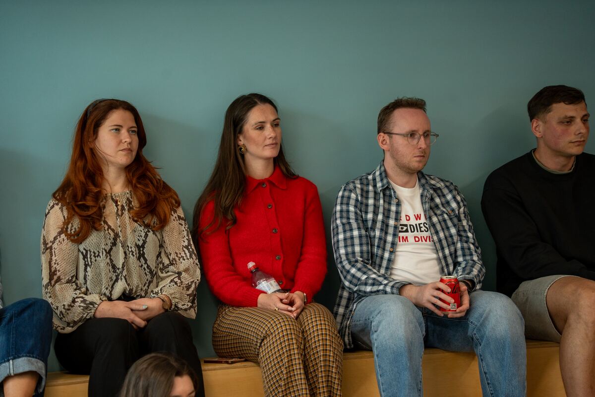 Employees listening during a Luella Learning female health workshop
