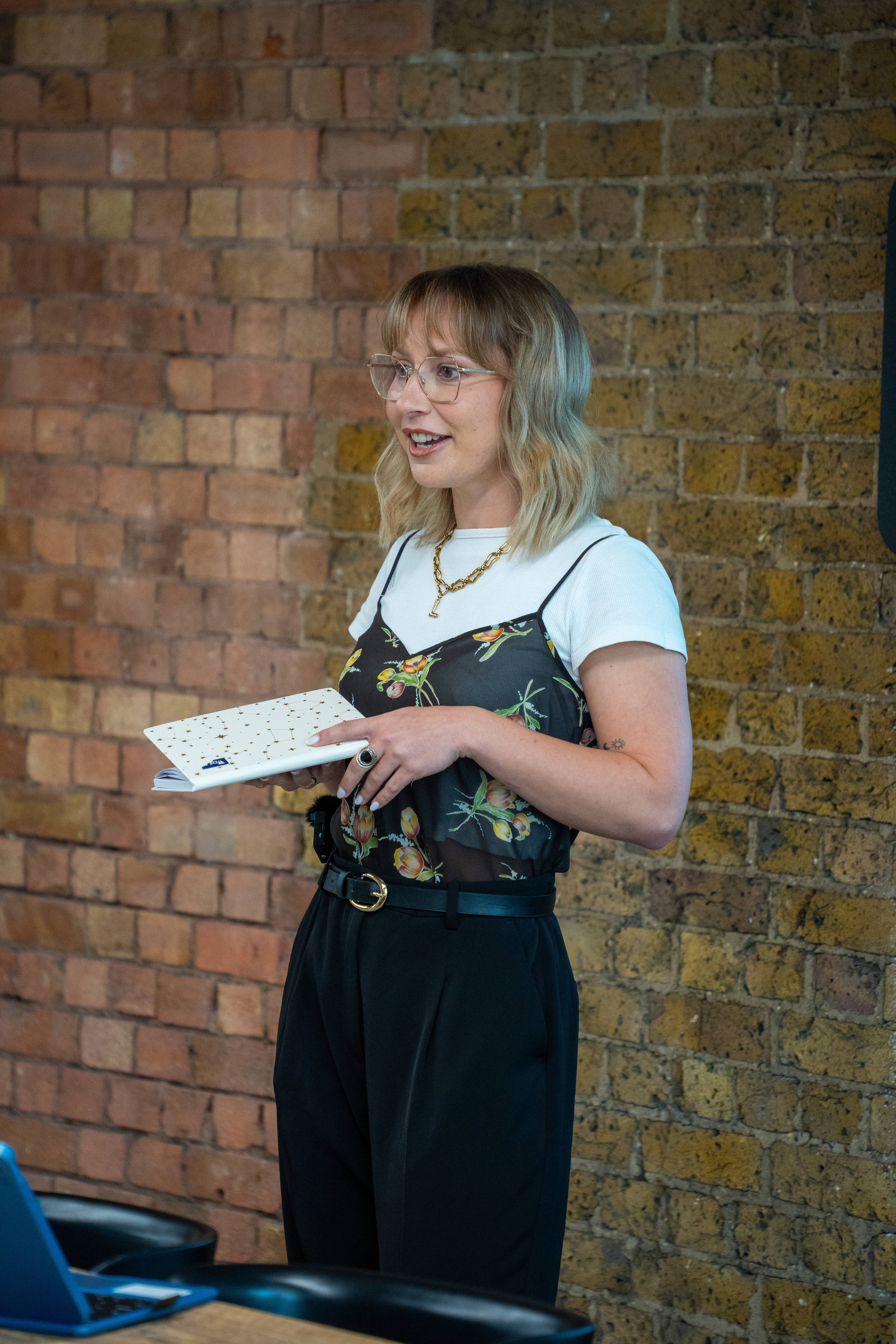 Lucy Twilley of Luella Learning delivering female health training to a workplace team