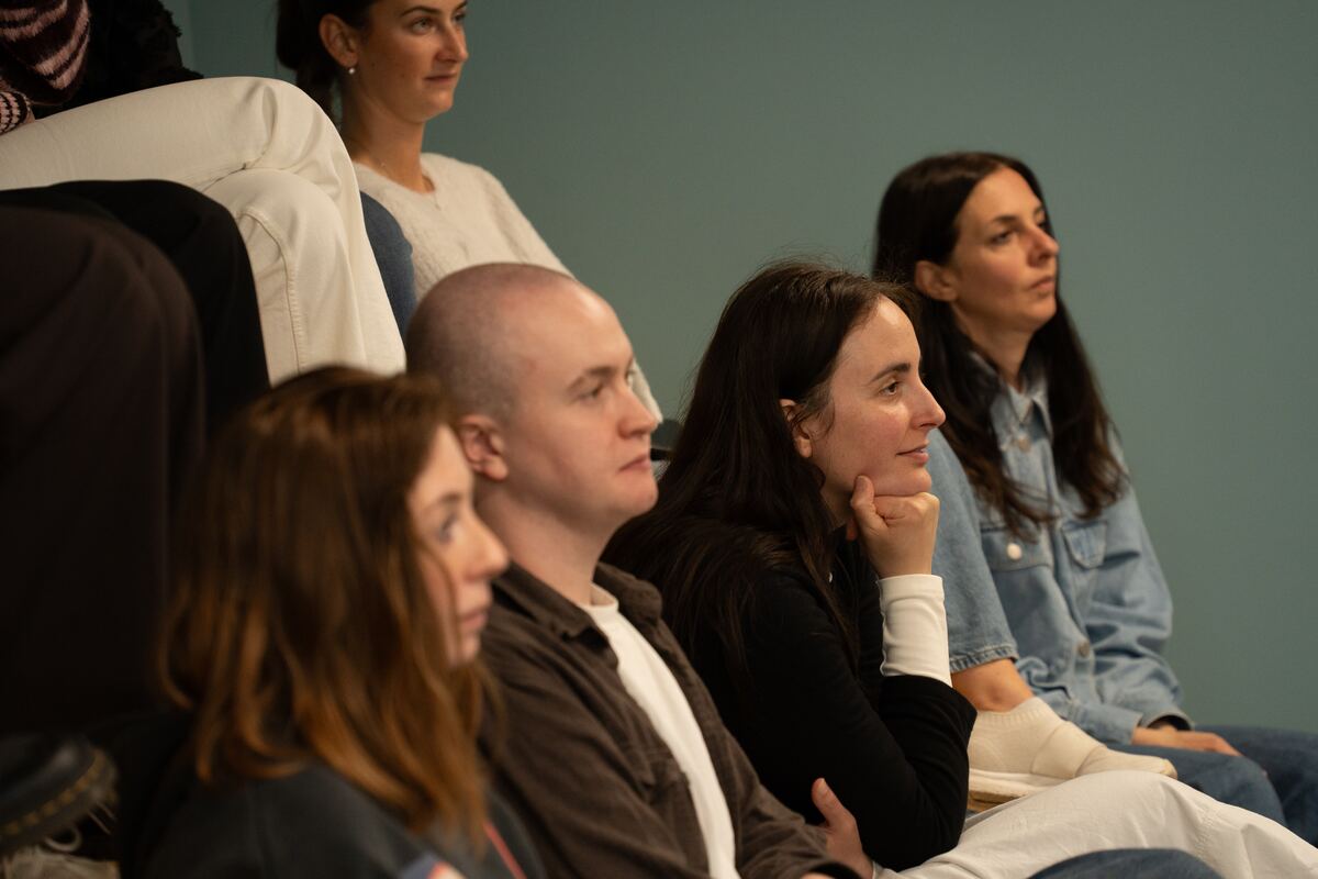 Team members engaged during a workplace menstrual health training session